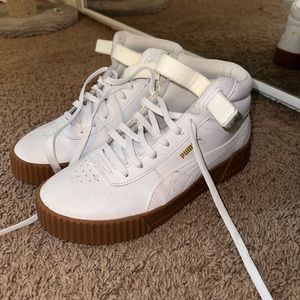 White high top pumas brown sole